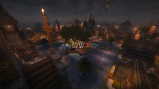 The market square at night, lit by lanterns